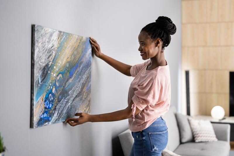 how to hang your new painting a simple guide