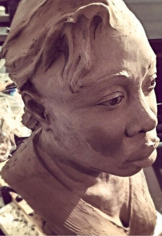 "Hear and Now", a ceramic bust of a woman by Gerald Griffin.